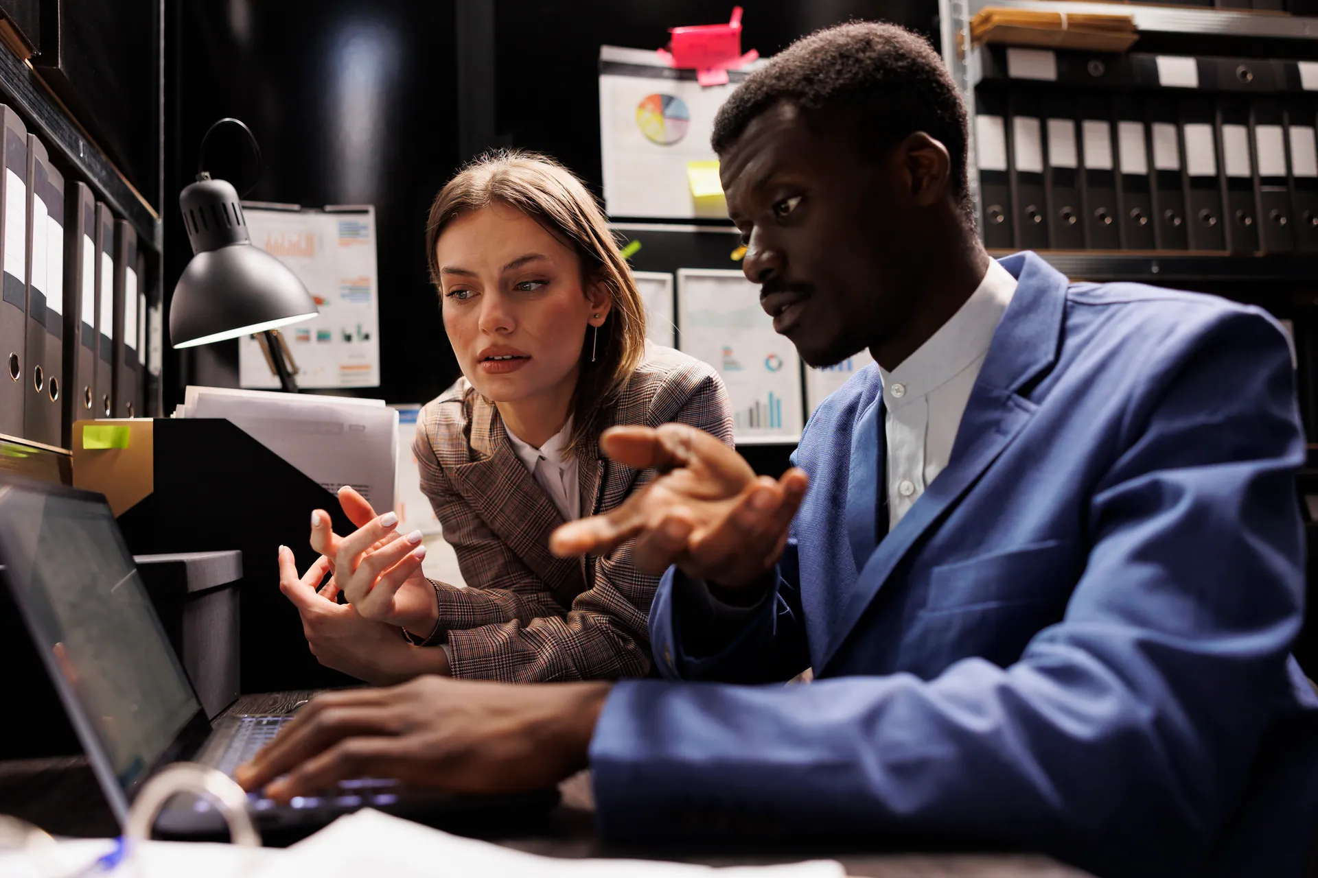Compliance team analyzing regulatory audit documents